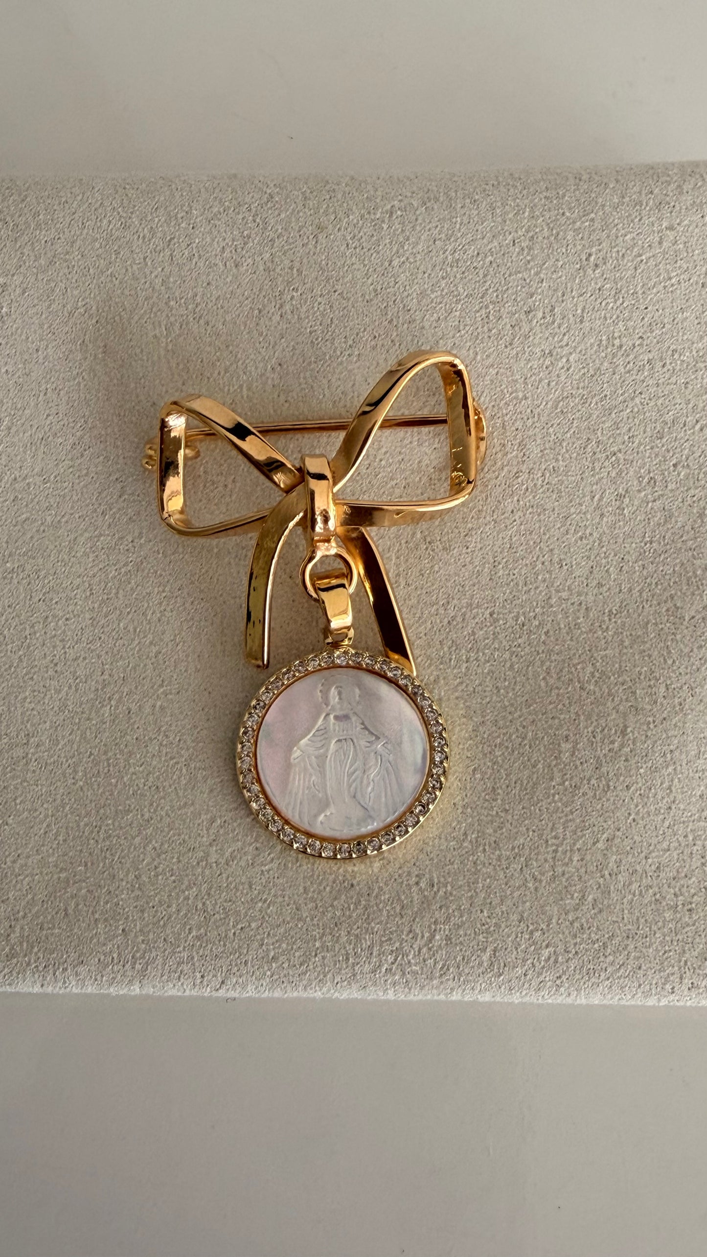 Golden Bow Shaped Baby Pin with Miraculous Virgin Mary Medal